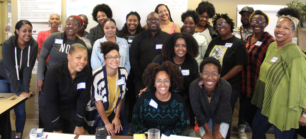 Image of 20 black people smiling